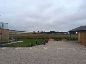 View east across neighbouring plot- click for photo gallery
